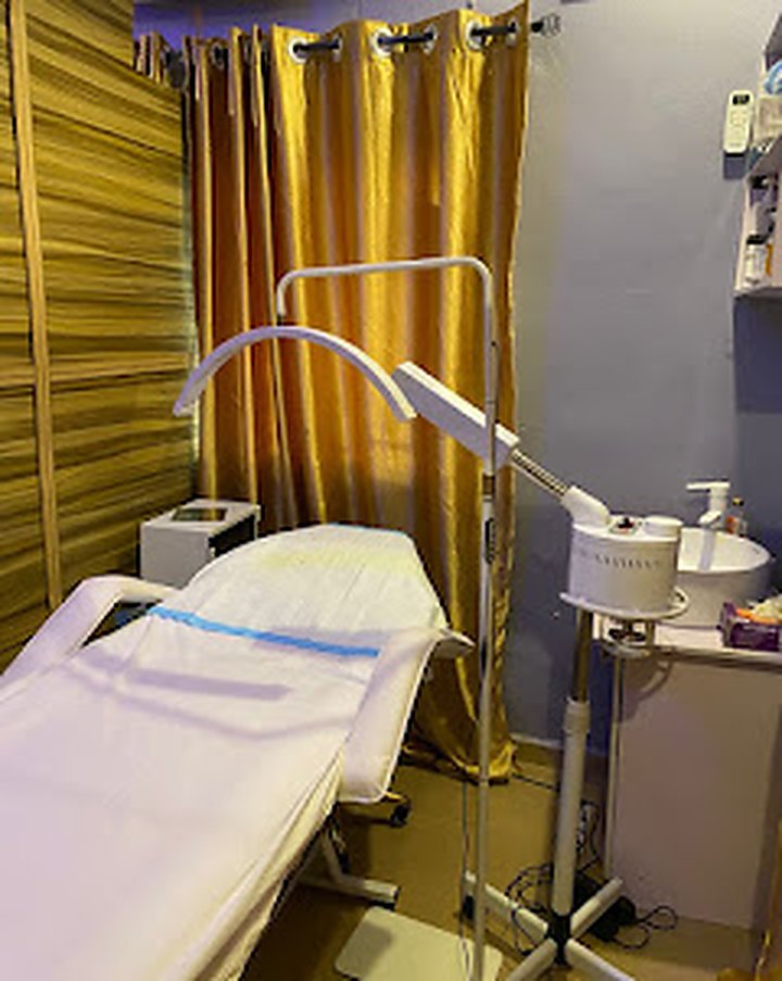Facial treatment room with professional skincare equipment